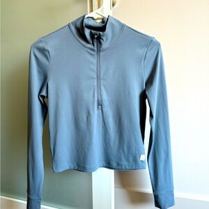 Vuori half-zip long sleeve top form fitting with stretch